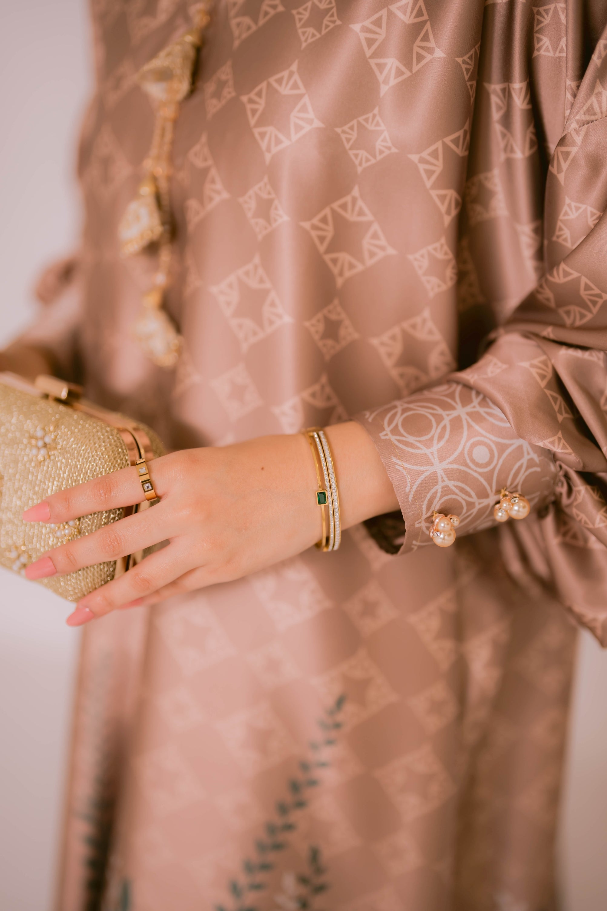 Pair of emerald whisper ring and bracelet